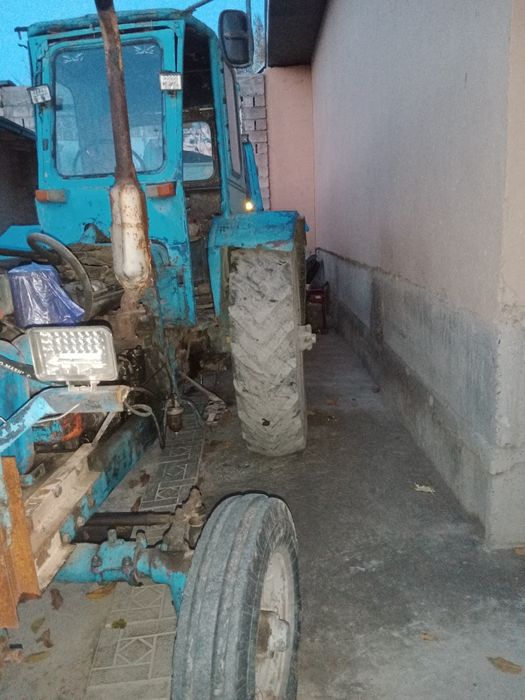 Traktor sotiladi barcha agregatlari bilan birga puli tel orqali gapl