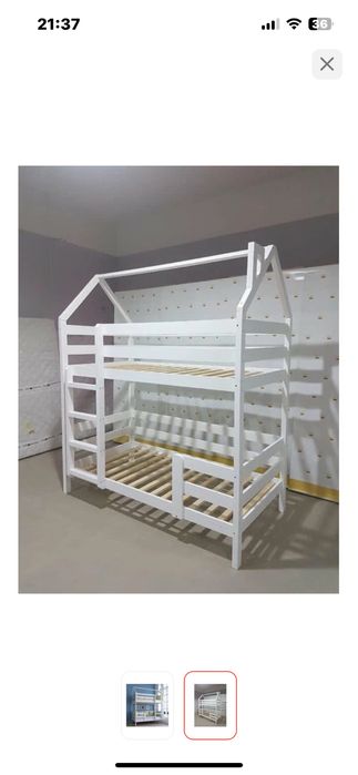 Двухъярусная кровать в отличном состоянии с матрасом.