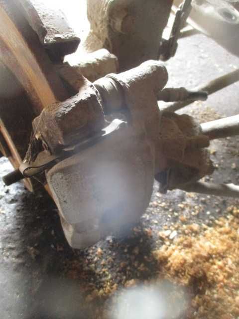 Etrier frana spate stanga dreapta TOYOTA COROLLA originali PROBATI