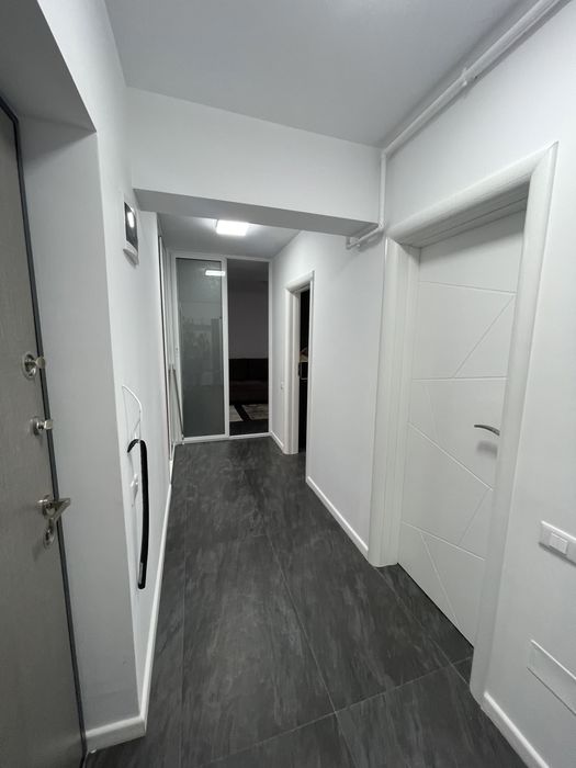 Garsoniera si loc de parcare si curte