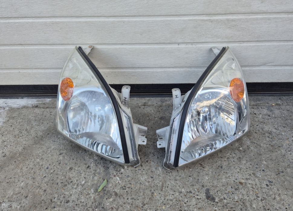 Faruri Originale Toyota Land Cruiser J120. 2002-2009.  Volan stinga.