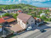 Casă P+E cu spațiu comercial, situată central în Filipeștii de Pădure