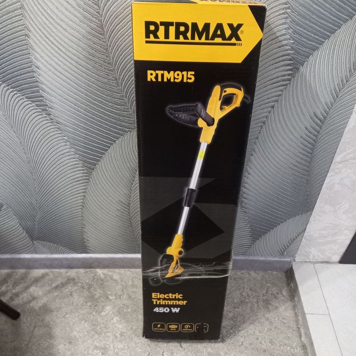 Электрическая газонокосилка