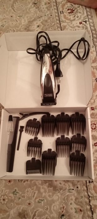 Машинка для стрижки волос.