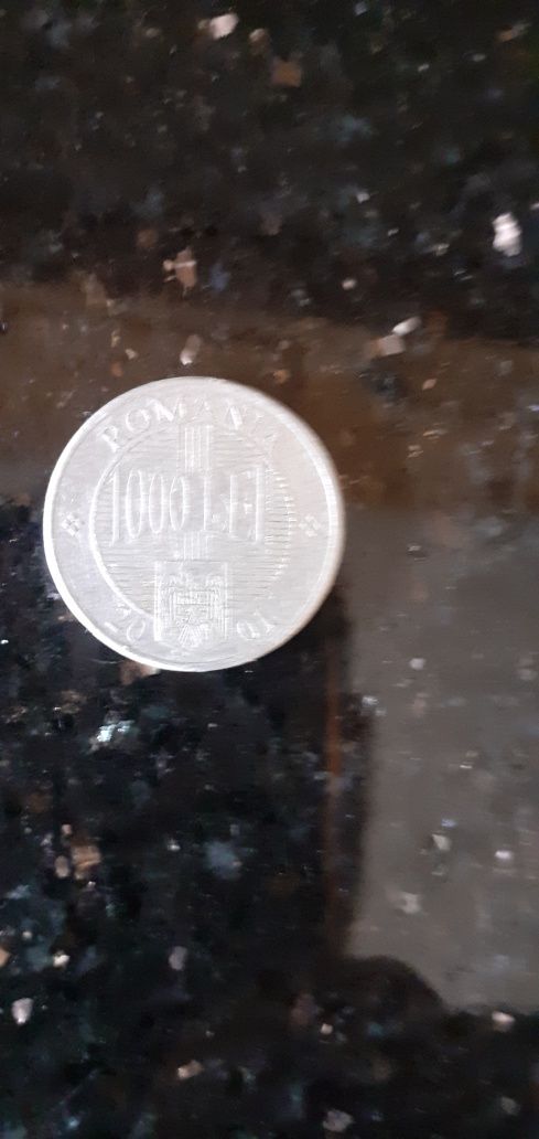 Vand moneda de 1000 de lei