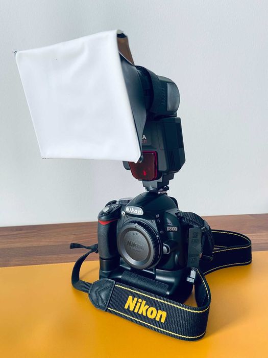 Nikon D3100 + 2 obiective (18-55 VR, 35/1.8G) + blitz, 11.800 cadre