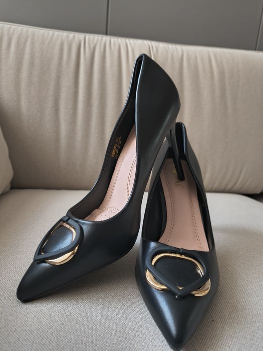 Обувки на висок ток