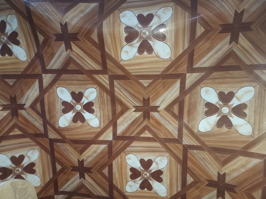 Linoleu model floare maron 519lei, floare gri549 lei 2x20 m rola