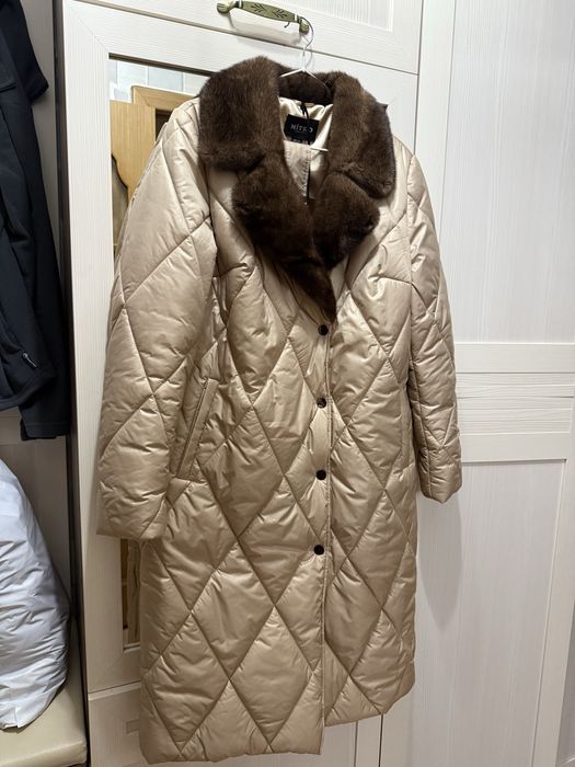 Новый пуховик с этикеткой