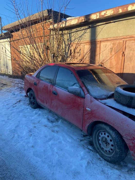 Мазда 323 , 1997г на запчасти