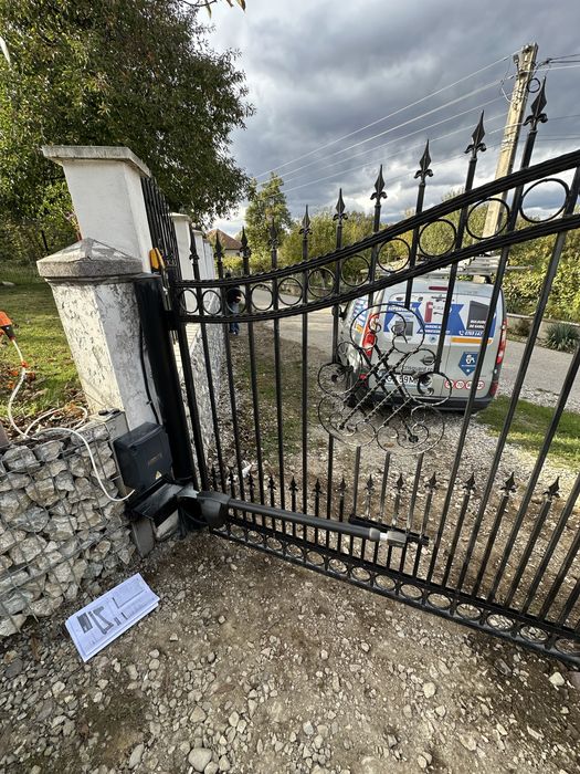 Montaj  Automatizari Porți Camere supraveghere usi de garaj