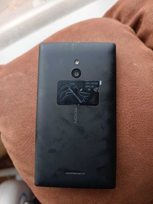 Телефон NOKIA DUAL SIM  работещ (за части )