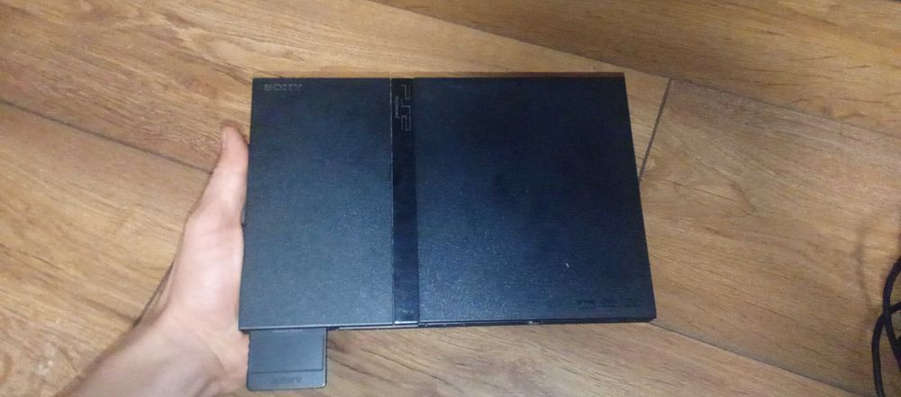 Playstation 2  stare forte buna are si fifa 9 pe el