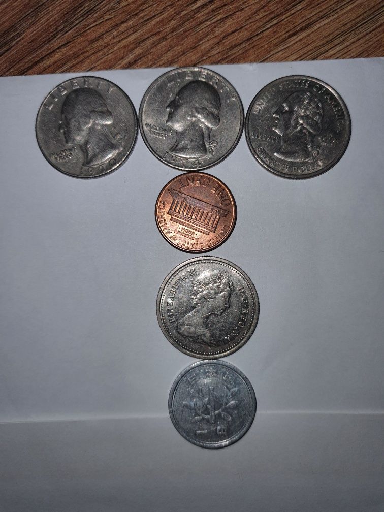 Quarter Dollar 1970,1974,2001; 25 cenți Canadieni 1985One cent 1990.