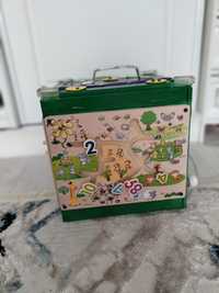 Продается развивающая игрушка "Бизиборд чемодан"