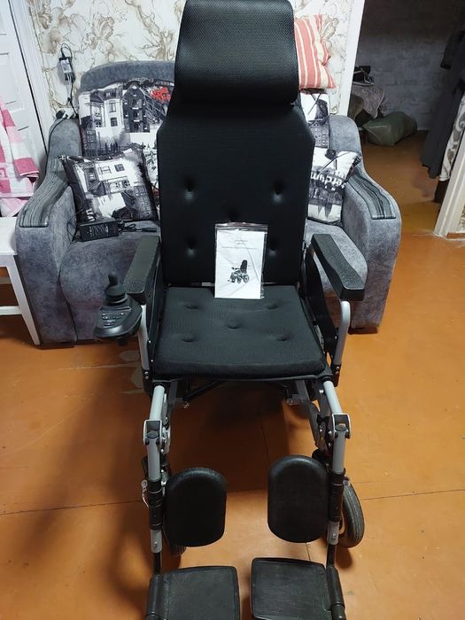 Электрическая кресло коляска