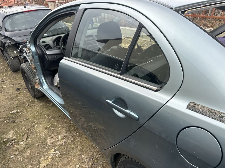 Задна лява врата за Митсубиши Лансър седан 2008-