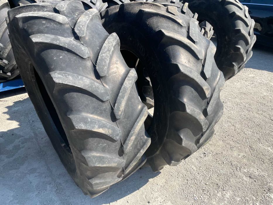 Roti fata semi-uzate 14.9r24 cauciucuri tractor john deere fata