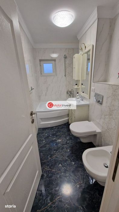 Apartament 3 camere spațios, renovat – etaj intermediar