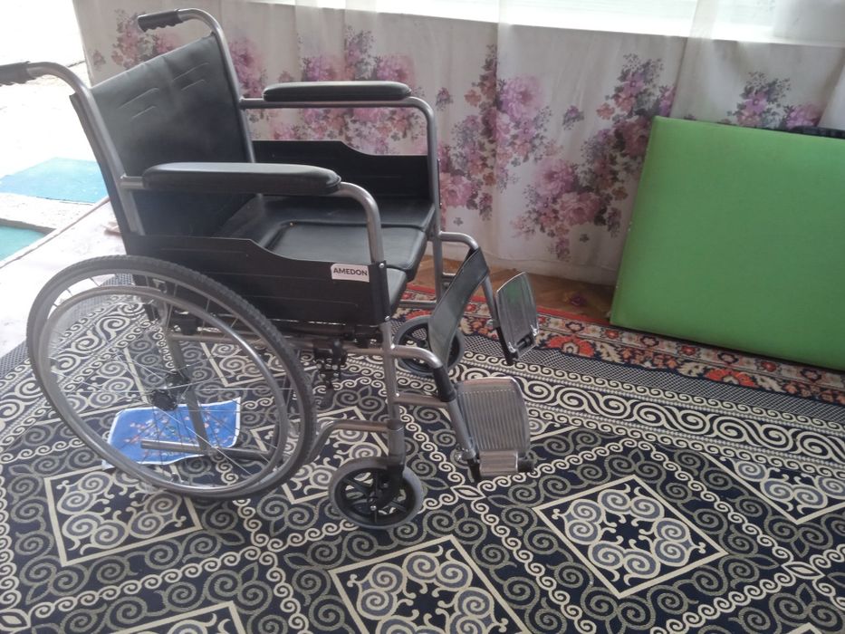 Инвалидная коляска