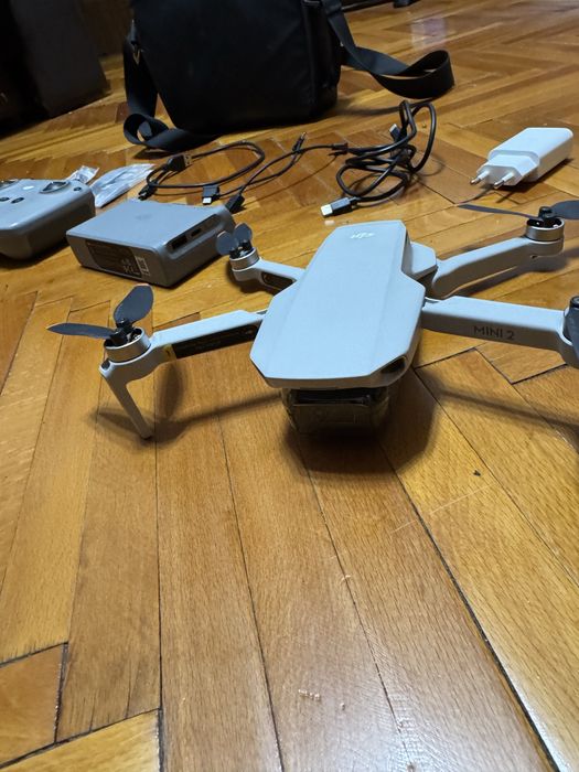 Dronă DJI Mini 2 Fly More Combo – Impecabilă, ca nouă + Suport Tableta