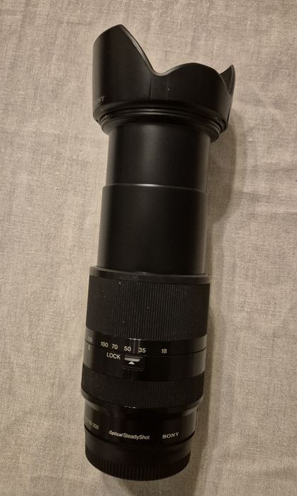 Обектив Sony 3.5-6.3f/18-200mm OSS със сенник + UV филтър