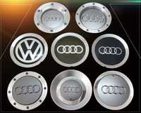 Центральные колпаки на Audi и молдинги фар