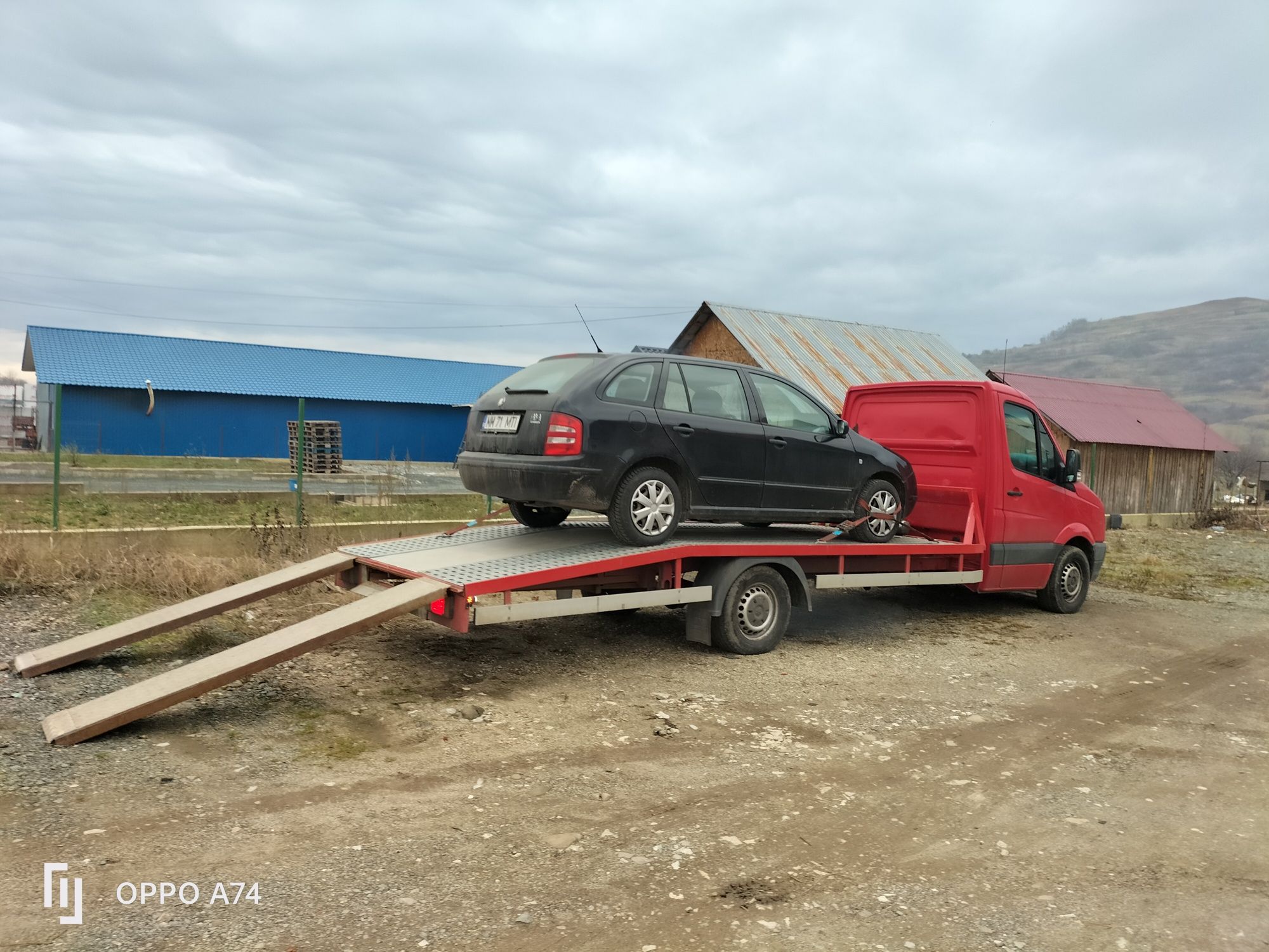 Tractari auto - transport auto și utilaje pe platforma