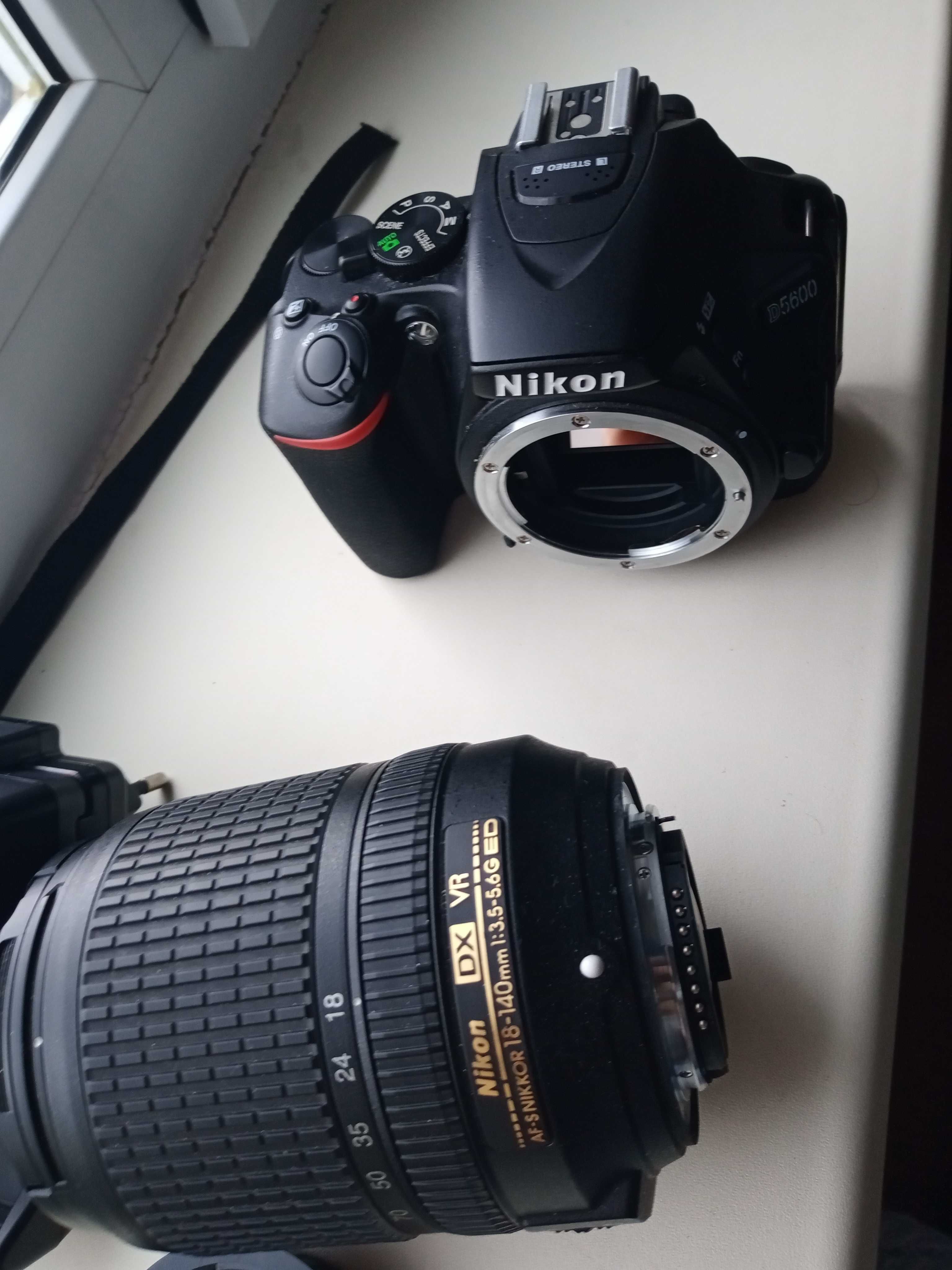 Nikon D5600 с объективом 18-140 мм (есть пример фотографии)