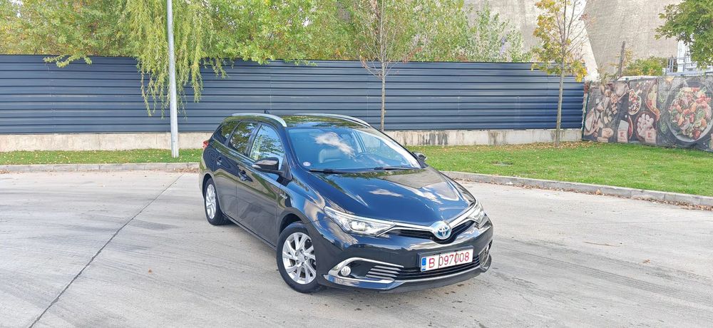 Toyota Auris 1.8 Hybrid facelift - baterie in garantie