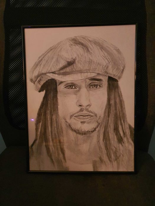 Portret în creion sau cărbune