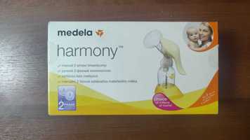 Молокоотсос medela