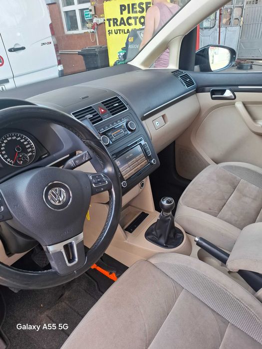 Vw touran 1,2 benzina, an 2011, 7 locuri, adus din Olanda,inscrisa