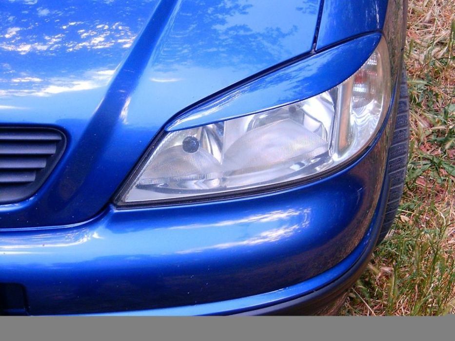 pleoape faruri opel astra g
