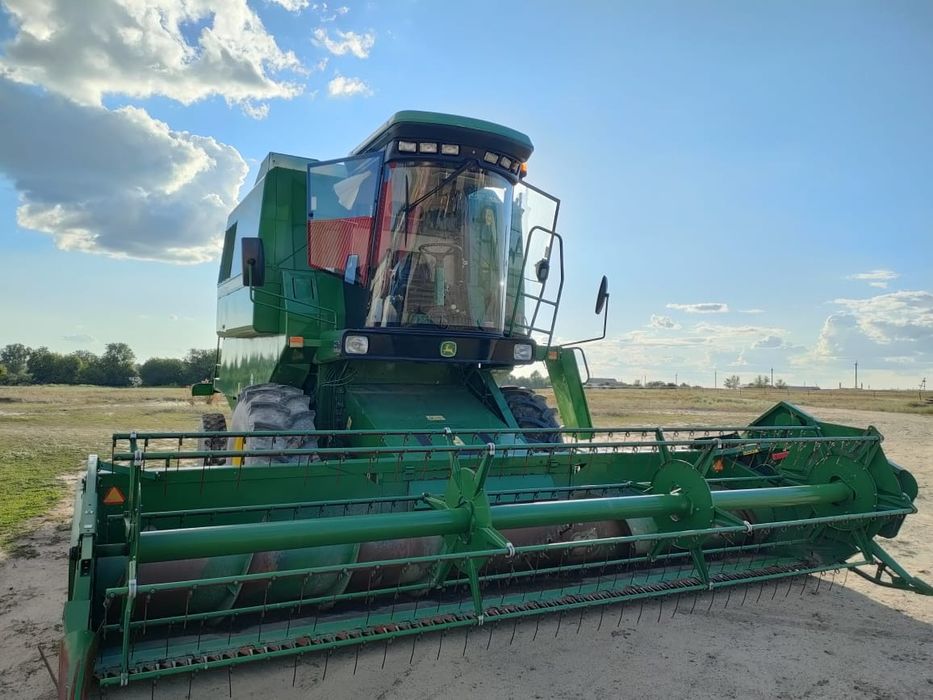 Комбайн John Deere w230