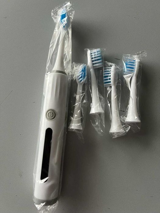 Periuta de dinti electrica baterii + 4 capete rezerva