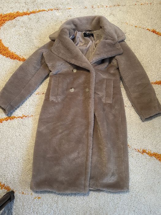 Vand haina de blana artificiala damă