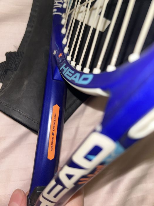 Теннисная ракетка