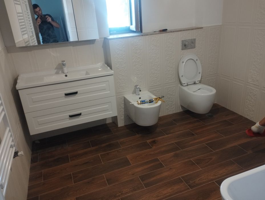 Amenajări interioare, apartamente , case , băi, curți , instalați sani
