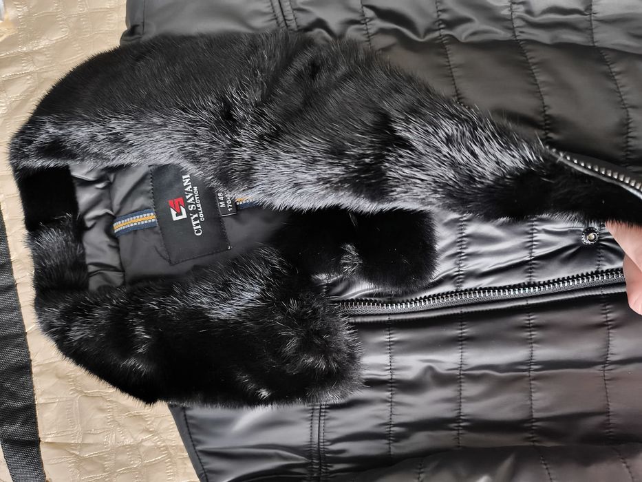 Продам новую куртку зимнюю и шапку