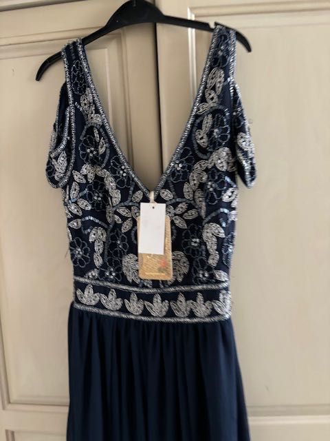 Нова маркова рокя Lipsy London размер С