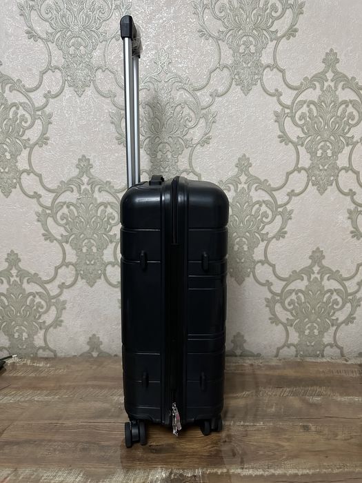 Чемодан 60 & 40 sm yangi ishlatilmagan