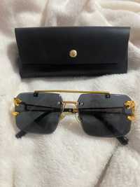 Черни слънчеви очила със златни орнаменти
