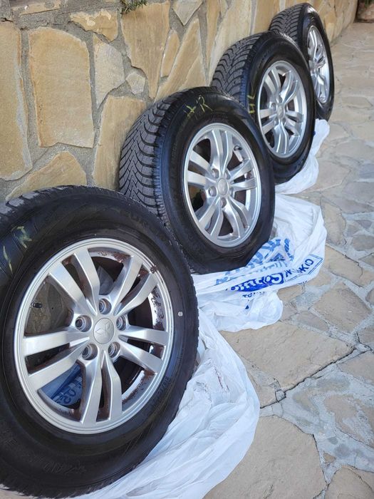 Всесезонни гуми Евровинтер с алуминиеви джанти Мицубиши 215/70R16 H100