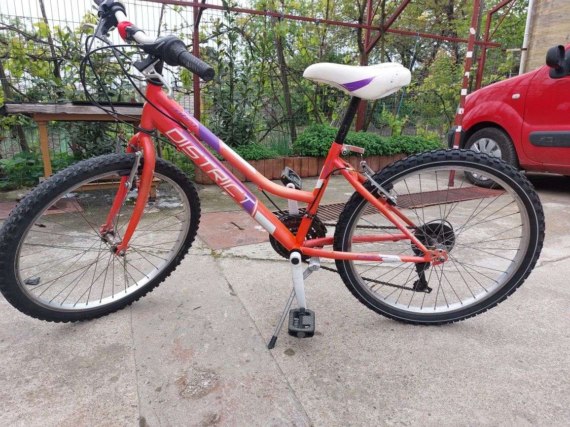 Bicicleta pentru fete 9-12 ani cu roti pe 24 toll