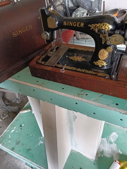 Mașina cusut manuală portabila Singer