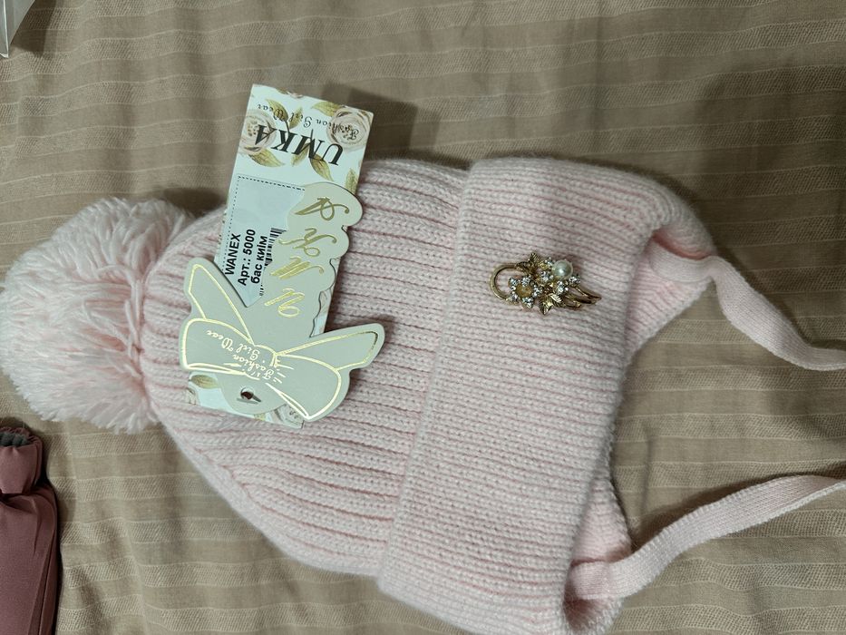 Продам новую зимнюю шапку на девочку!