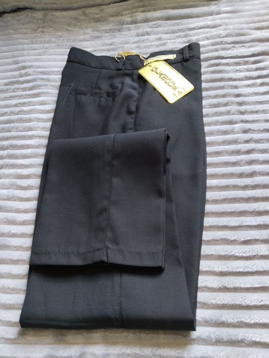 Продам подростковые черные брюки (новые)