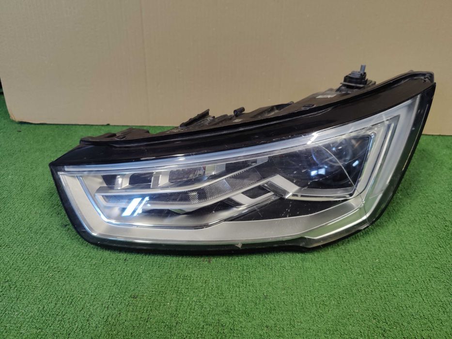 far stanga audi a1 geam avariat led