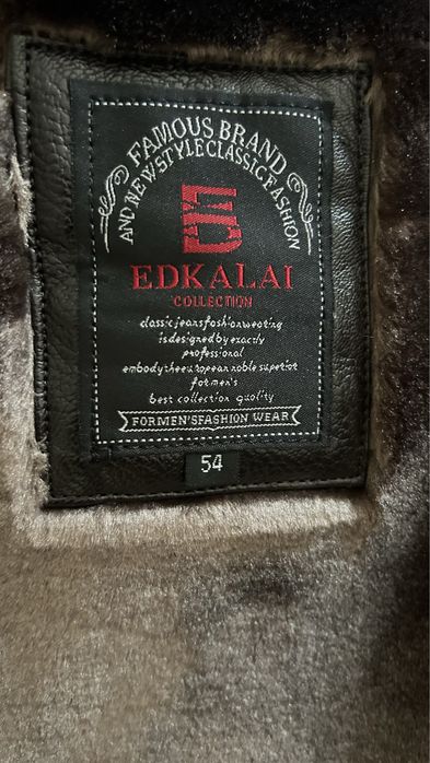 Зимняя дубленка с норковым воротником.